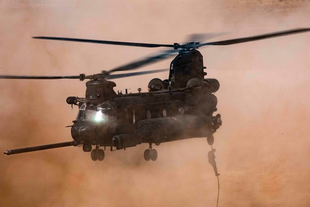 U.S. and Moroccan troops fast-rope out of a CH-47 Chinook in Tifnit, Morocco, June 14, 2021, during African Lion, U.S. Africa Command's largest joint, annual exercise.